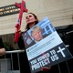 Protesters rally outside the federal court before a hearing to consider a class-action lawsuit filed on behalf of Iraqi nationals facing deportation, in Detroit, Michigan, June 21, 2017.