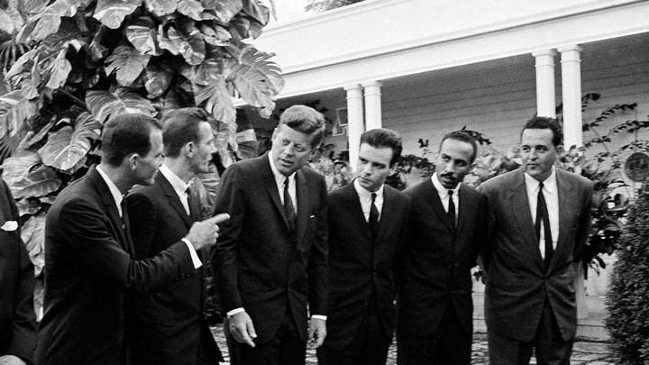 President John F. Kennedy chats with a group of leaders in the Bay of Pigs invasion on Dec. 27, 1962.
