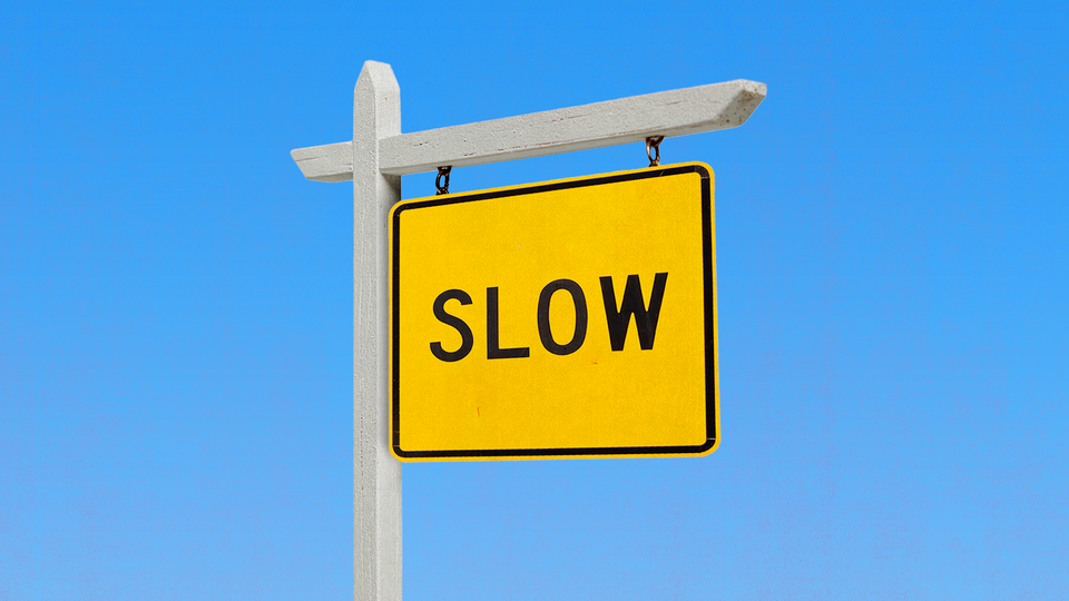 An illustration of a yellow "For Sale" sign that reads: "Slow"