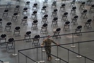 Rows of empty chairs at a mass-vaccination site