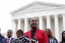 A photo of a speaker outside the Supreme Court