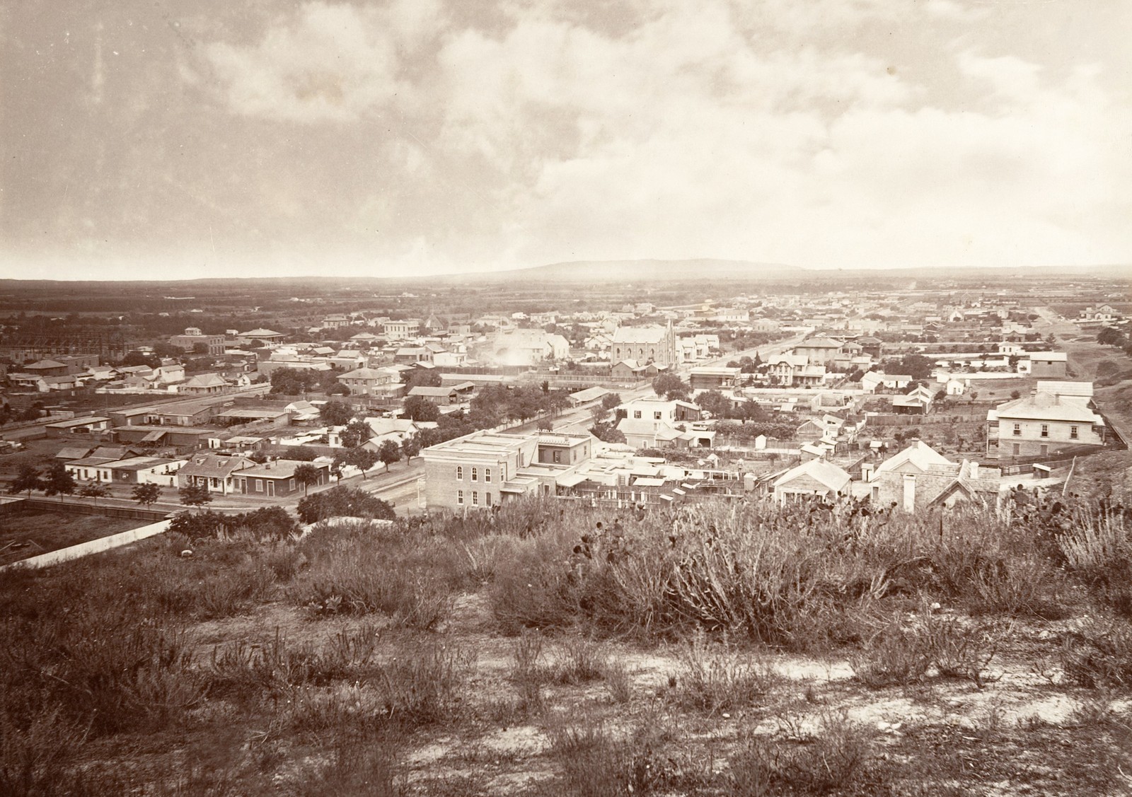 A view of the relatively small city of Los Angeles, seen from a nearby hilltop, in 1876.