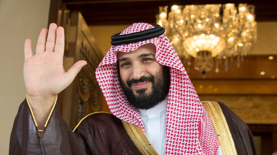 Mohammed bin Salman waves in Riyadh, Saudi Arabia.