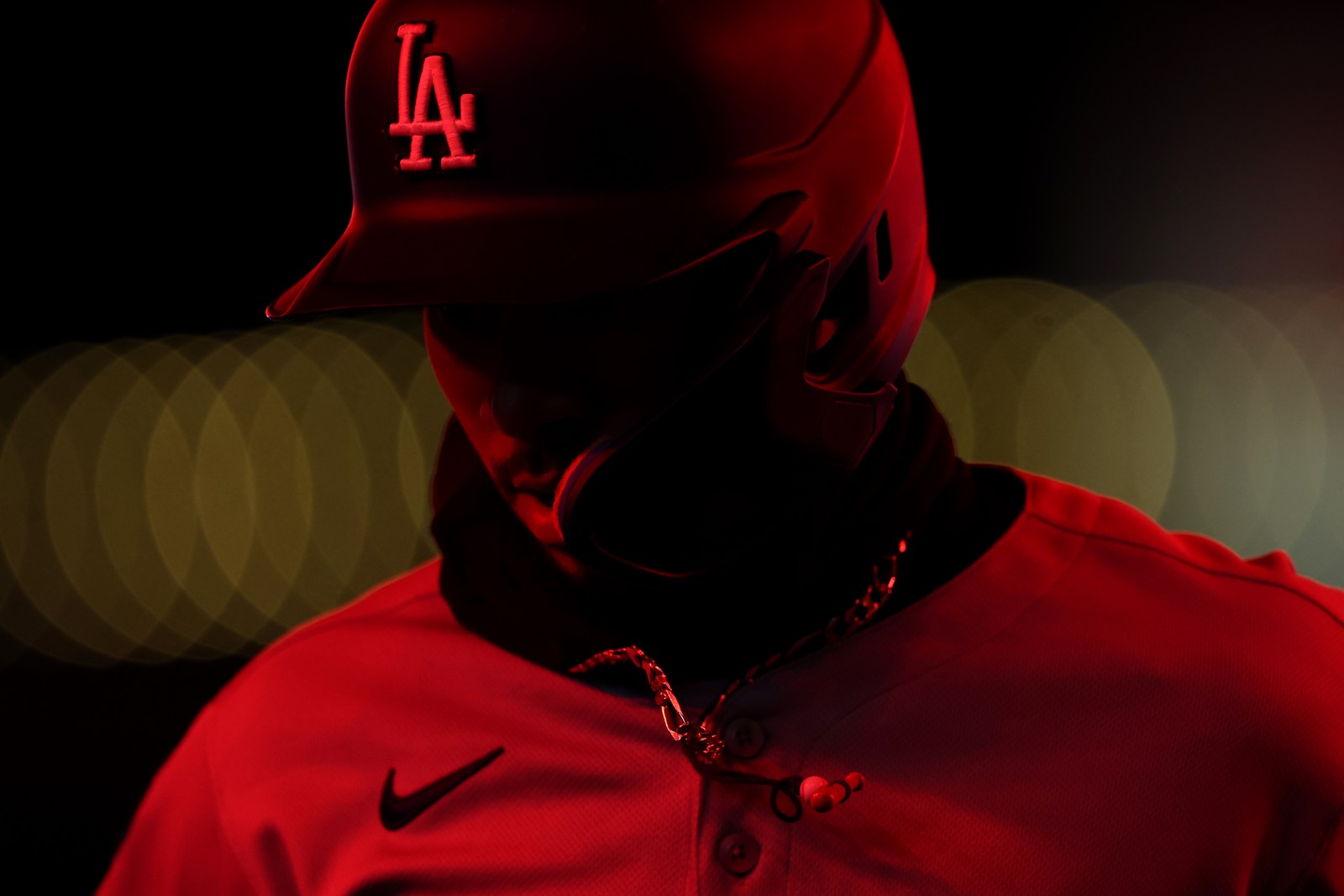 A close view of a baseball player wearing a batting helmet