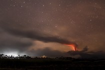 Mount Raung, a volcano in Indonesia, erupts at night.