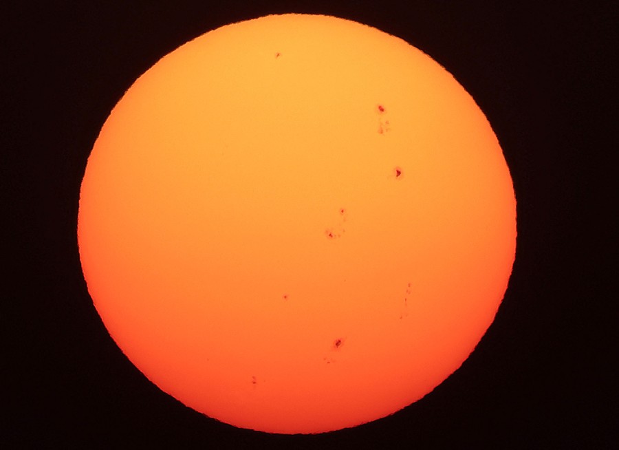 A handful of sunspots on the sun's surface