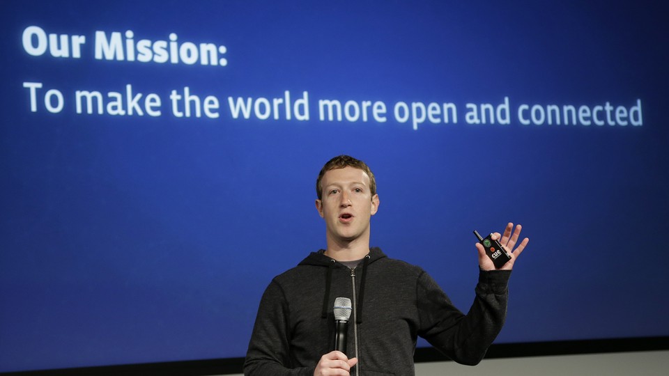 Mark Zuckerberg onstage with a microphone
