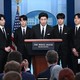 V, Jungkook, Jimin, RM, Jin, J-Hope, and Suga in the White House press briefing room