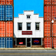 a small business between shipping containers