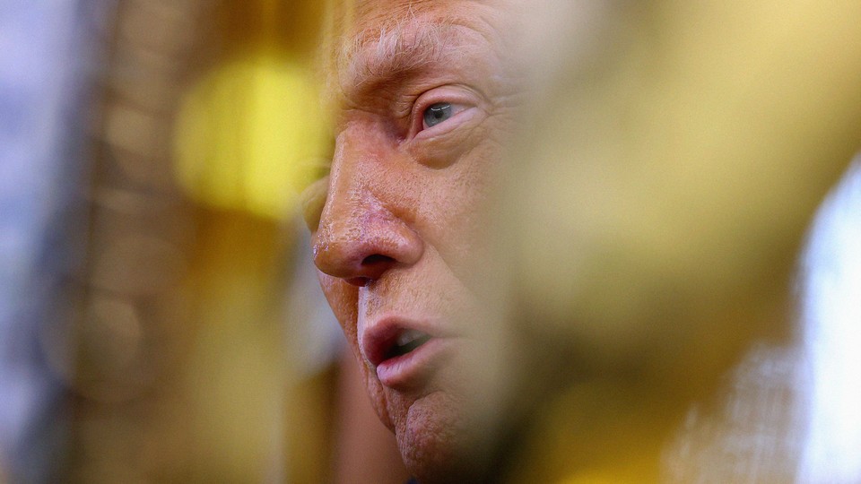 A photograph of Trump's face partially obscured by a blurred yellow effect in the foreground