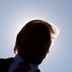 Donald Trump's face eclipsed by a halo of sunshine