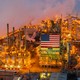 An oil field in McKintrick, California, with an American flag displayed