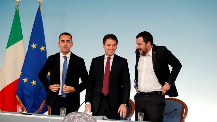 Di Maio, Prime Minister Giuseppe Conte, and Salvini stand after a press conference in Rome.