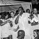 P. Diddy at the White Party surrounded by celebrities
