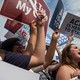 People protesting for the ACA