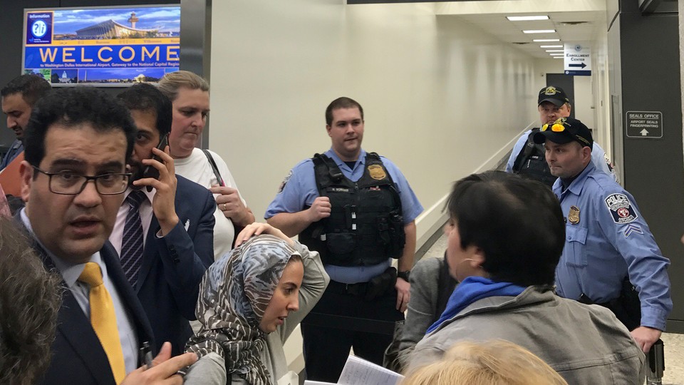 Lawyers gather to discuss how to gain access to detainees held under a travel ban imposed by President Donald Trump's executive order.