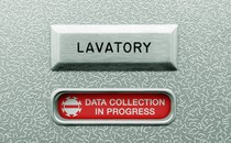 Illustration of an airplane lavatory door that says "data collection in progress"