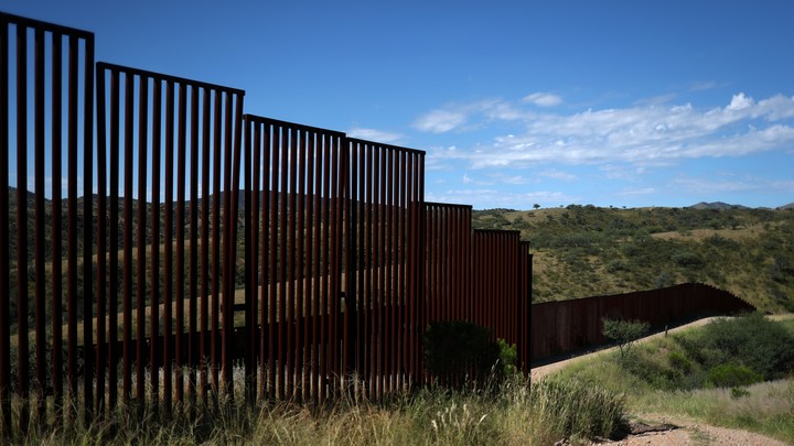Different generations of the U.S. border wall with Mexico are seen from the United States in Nogales, Arizona