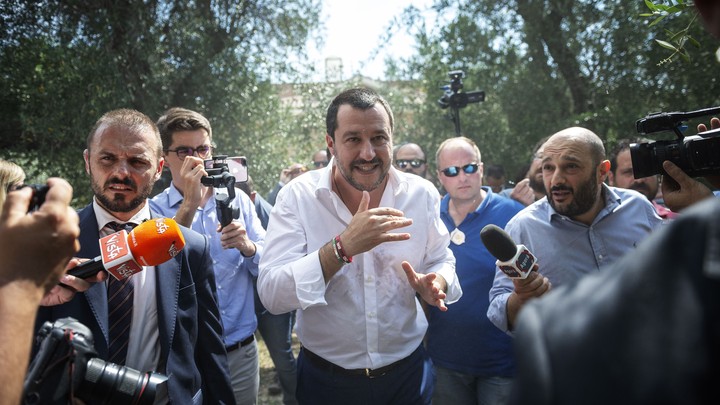 Italian Interior Minister Matteo Salvini answers questions from the media.