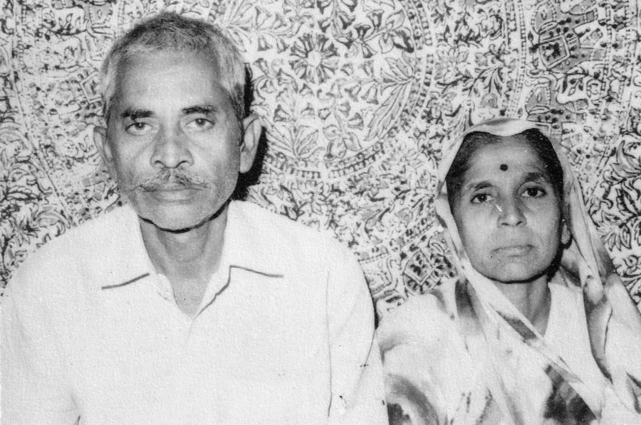 A black-and-white portrait of a man and a woman.