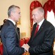 Recep Tayyip Erdoğan shakes hands with Jens Stoltenberg.