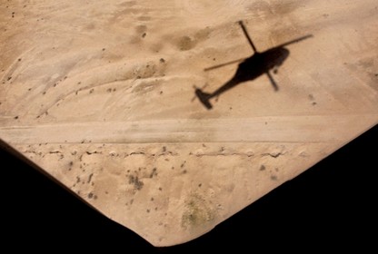 1159th Medical Company flies Black Hawks evacuating injured U.S. soldiers, Iraqi forces and civilians to the FOB Speicher Hospital and Balad Air Force Hospital, in Iraq, April 5, 2005.