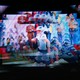 Photo of multiple blurry screens showing the Super Bowl