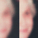 Blurry panels of someone's face in front of a black background