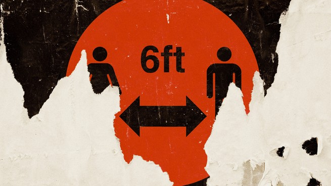 A sign signaling that people should stand 6 feet apart is shown tattered and worn