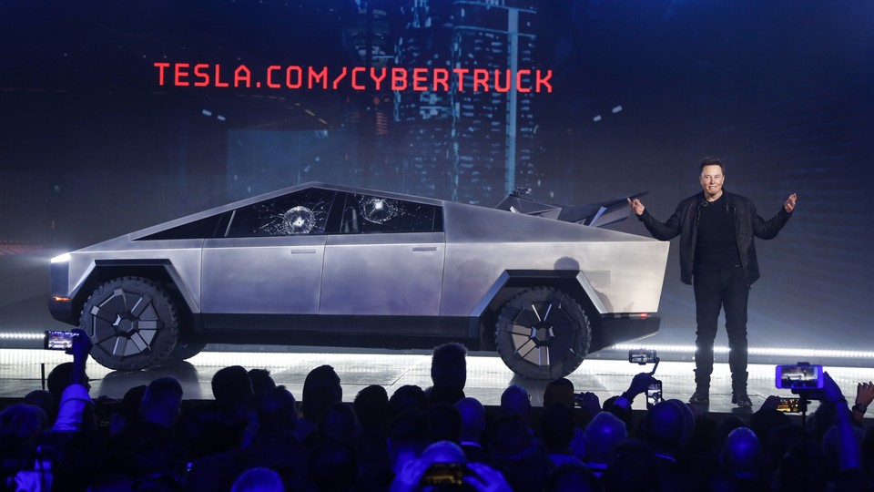 Tesla CEO Elon Musk introduces the CybertTruck at Tesla's design studio Thursday, March 14, 2019, in Hawthorne, Calif