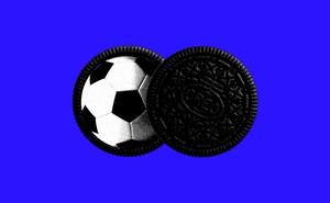 An image of a soccer ball as the filling of a Nabisco Oreo cookie