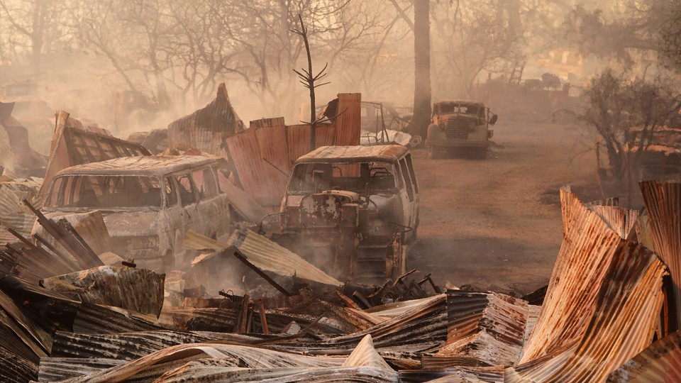 North of Chico, California, the Park Fire burned vans, cars, and houses in its path.