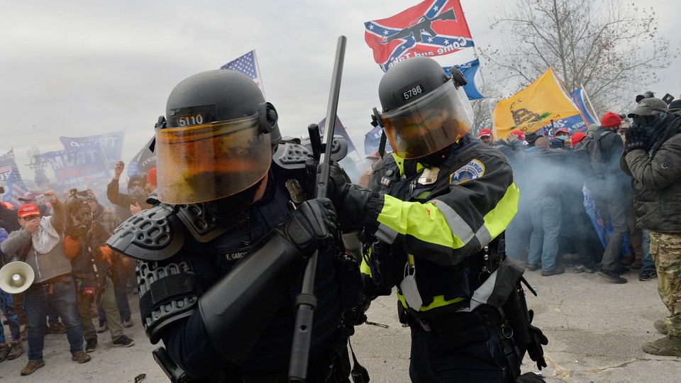 Trump supporters clash with police and security forces as they try to storm the U.S. Capitol.