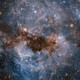Gas around one of the Milky Way's satellite galaxies glows white.