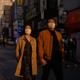 A couple in South Korea wearing facemasks