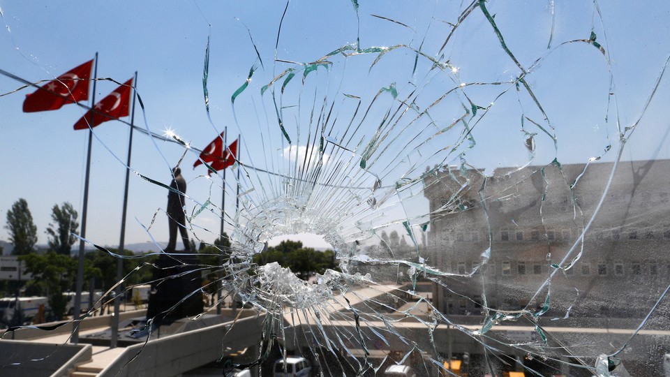 A shattered window at police headquarters in Ankara following a failed July 2016 coup attempt