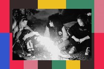 Yellowjackets cast members around a fire