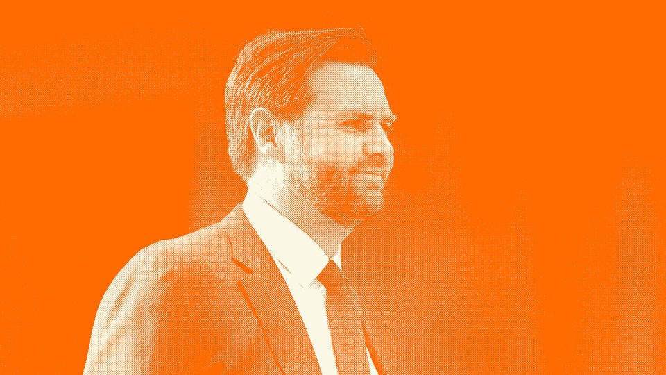 J. D. Vance smiles as he walks