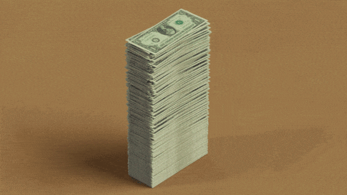 Shrinking stack of dollar bills