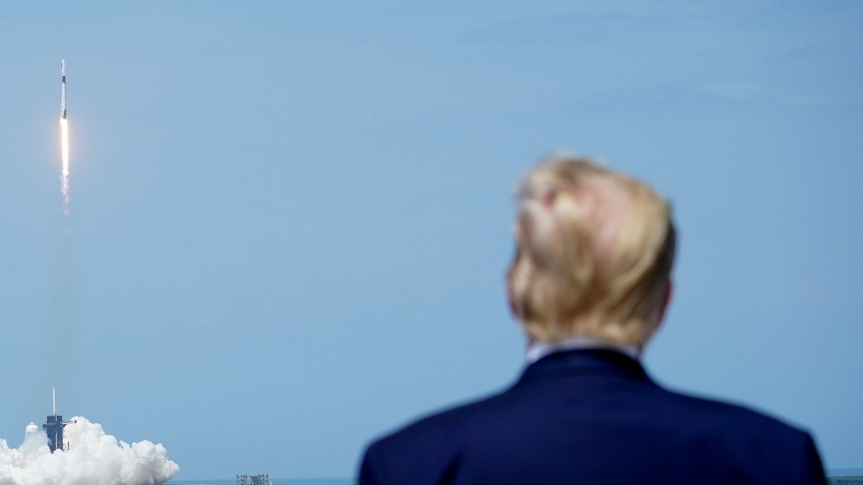 President Donald Trump watching an astronaut launch