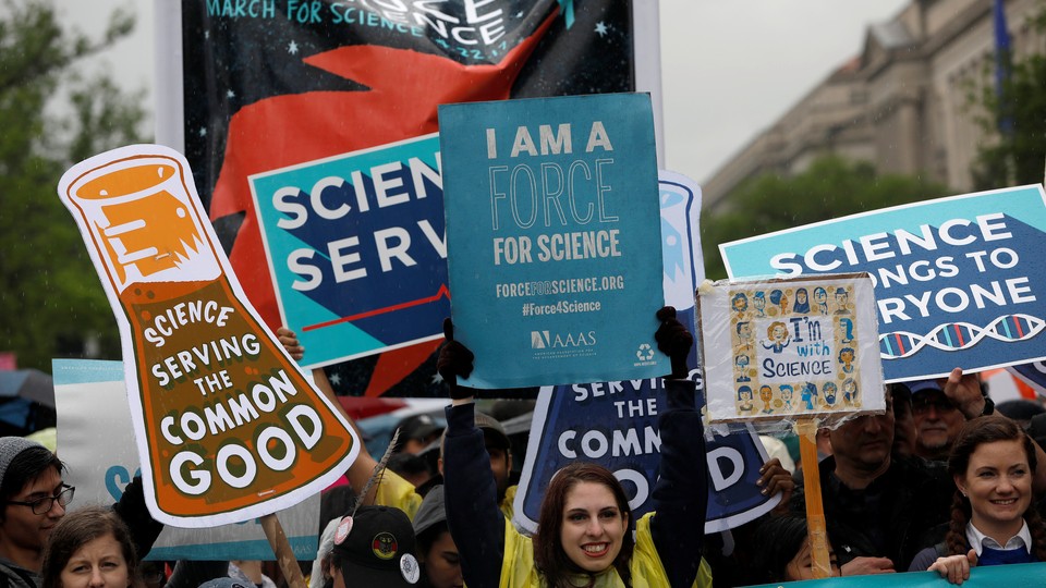 Demonstrators march to the U.S. Capitol during the March for Science in Washington.