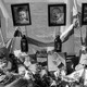 A memorial with photos of Shiri, Ariel, and Kfir Bibas and Oded Lifshitz in Tel Aviv