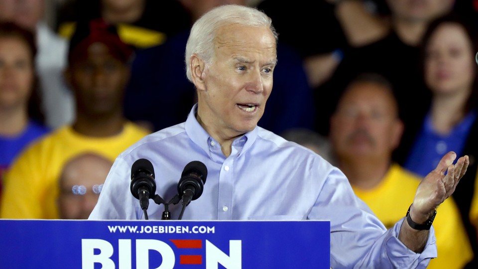Joe Biden, flanked by union members, speaks at his campaign kickoff rally in Pittsburgh.