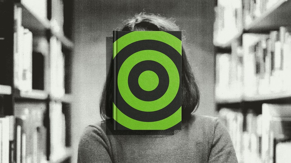 a librarian with a book obscuring her face—the book's cover is a target