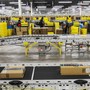 Workers at an Amazon f​ulfillment center in Staten Is​land