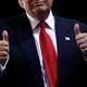 Trump gives thumbs-up.