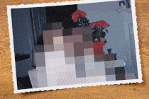A family sitting on a couch comes into focus from a pixelated view.