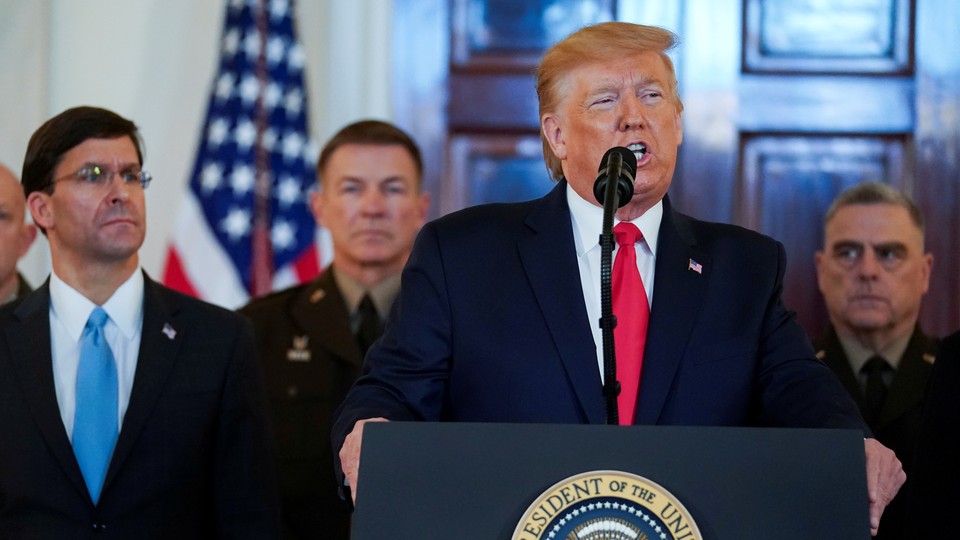 U.S. President Donald Trump delivers a statement about Iran flanked by U.S. Defense Secretary Mark Esper, Army Chief of Staff General James McConville and Chairman of the Joint Chiefs of Staff Army General Mark Milley in the Grand Foyer at the White House in Washington, U.S.