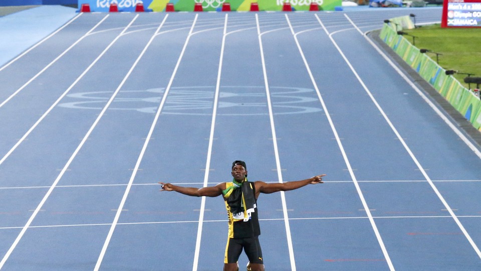 Jamaica's Usain Bolt poses after winning the gold.