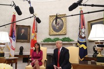 Donald Trump and Nikki Haley sitting in the Oval Office on October 9, 2018